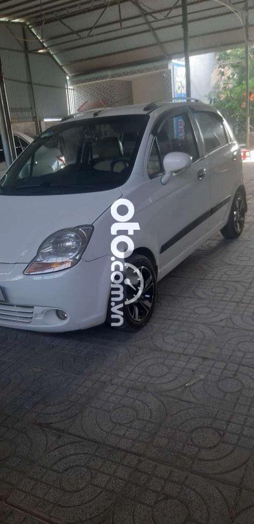 Daewoo Tico 2009 - Bán xe Chevrolet Spark đời 2009, màu trắng còn mới