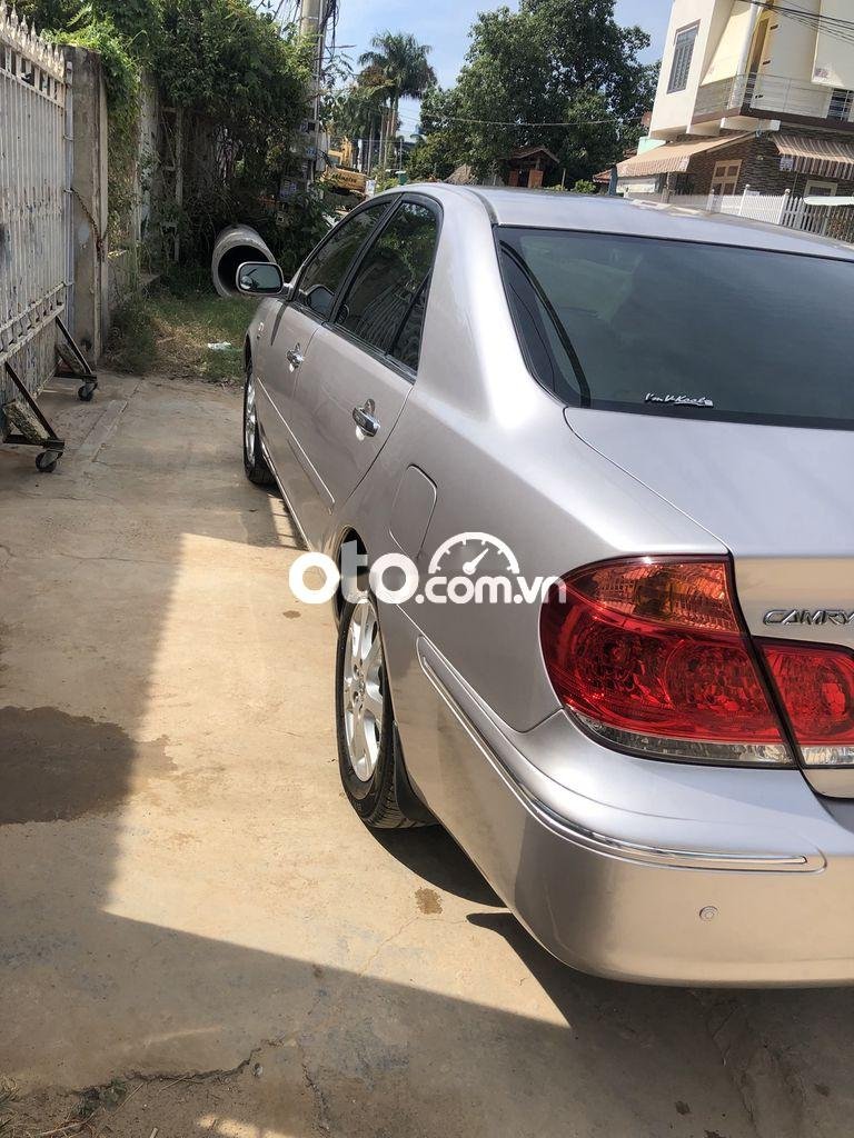 Toyota Camry 2.4G 2005 - Cần bán Toyota Camry 2.4G đời 2005, màu bạc chính chủ, 319 triệu