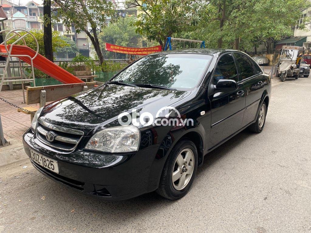 Daewoo Lacetti EX 2010 - Bán Daewoo Lacetti EX sản xuất 2010, màu đen số sàn