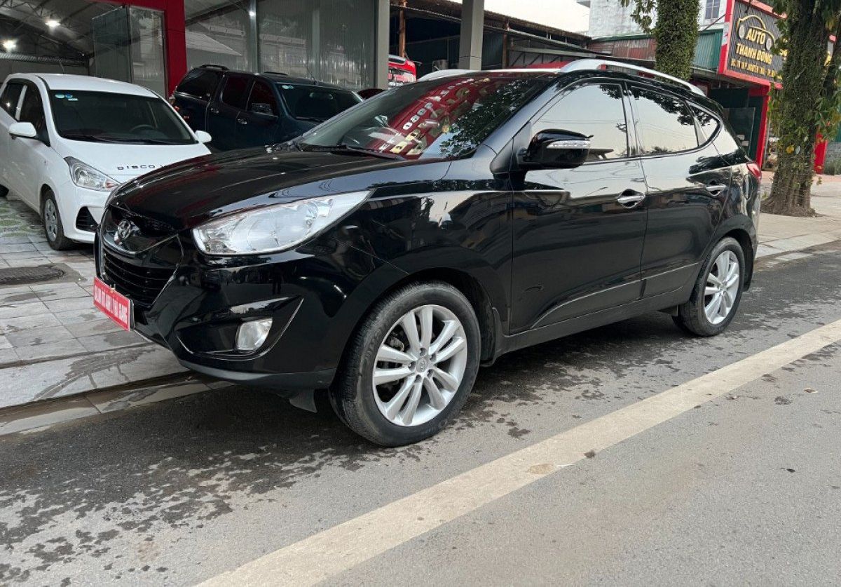 Hyundai Tucson   2.0 AT 4WD  2011 - Cần bán Hyundai Tucson 2.0 AT 4WD năm 2011, màu đen, nhập khẩu nguyên chiếc