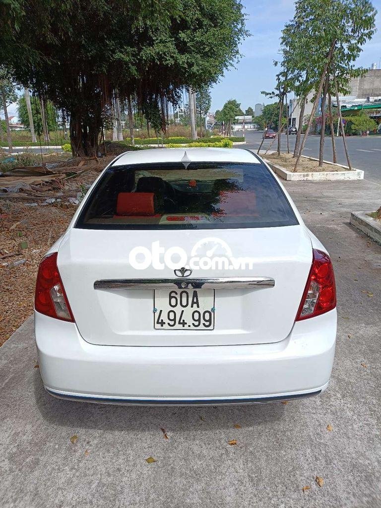 Daewoo Lacetti MT 2004 - Bán Daewoo Lacetti MT 2004, màu trắng, xe nhập