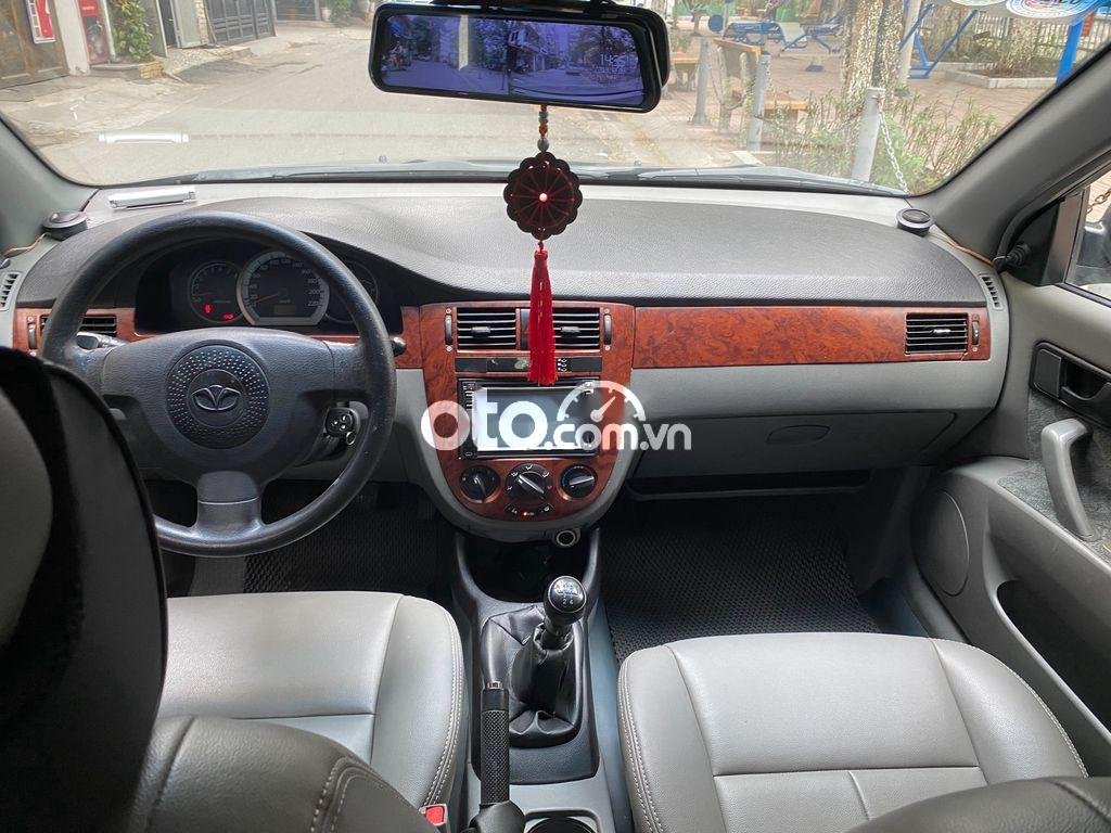 Daewoo Lacetti EX 2010 - Bán Daewoo Lacetti EX sản xuất 2010, màu đen số sàn