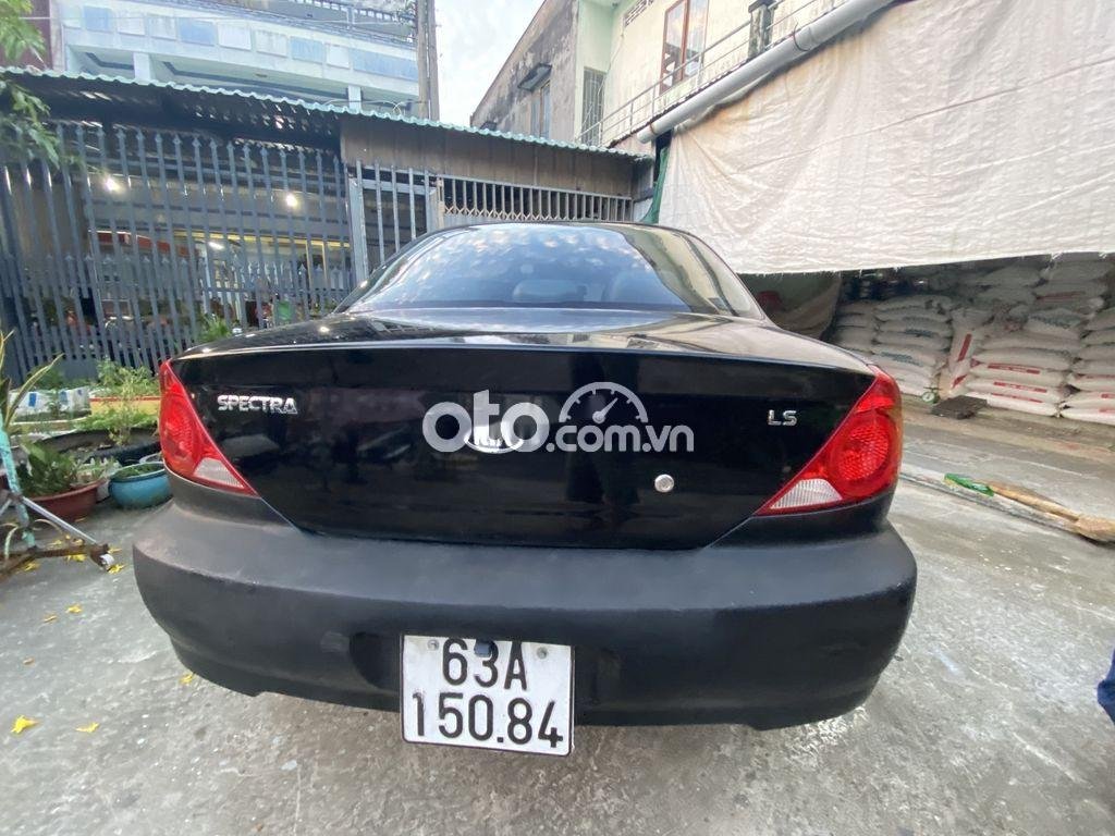 Kia Spectra LS 2005 - Bán xe Kia Spectra LS 2005, màu đen xe gia đình, 98tr