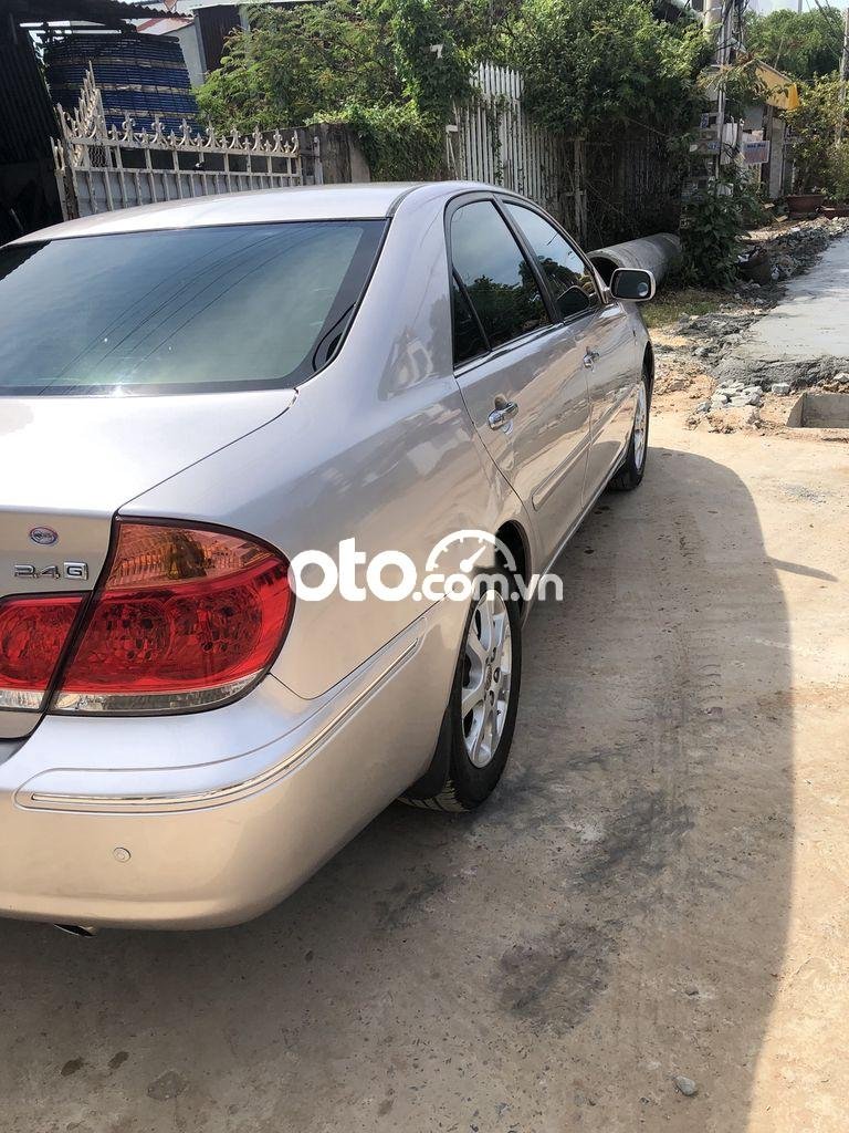 Toyota Camry 2.4G 2005 - Cần bán Toyota Camry 2.4G đời 2005, màu bạc chính chủ, 319 triệu