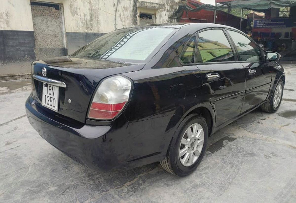 Buick   1.8 AT 2009 - Bán xe Buick Excelle 1.8 AT đời 2009, màu đen, nhập khẩu 