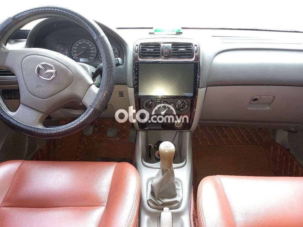 Mazda 626 MT 2001 - Bán Mazda 626 MT đời 2001, màu đen, nhập khẩu nguyên chiếc, giá chỉ 125 triệu