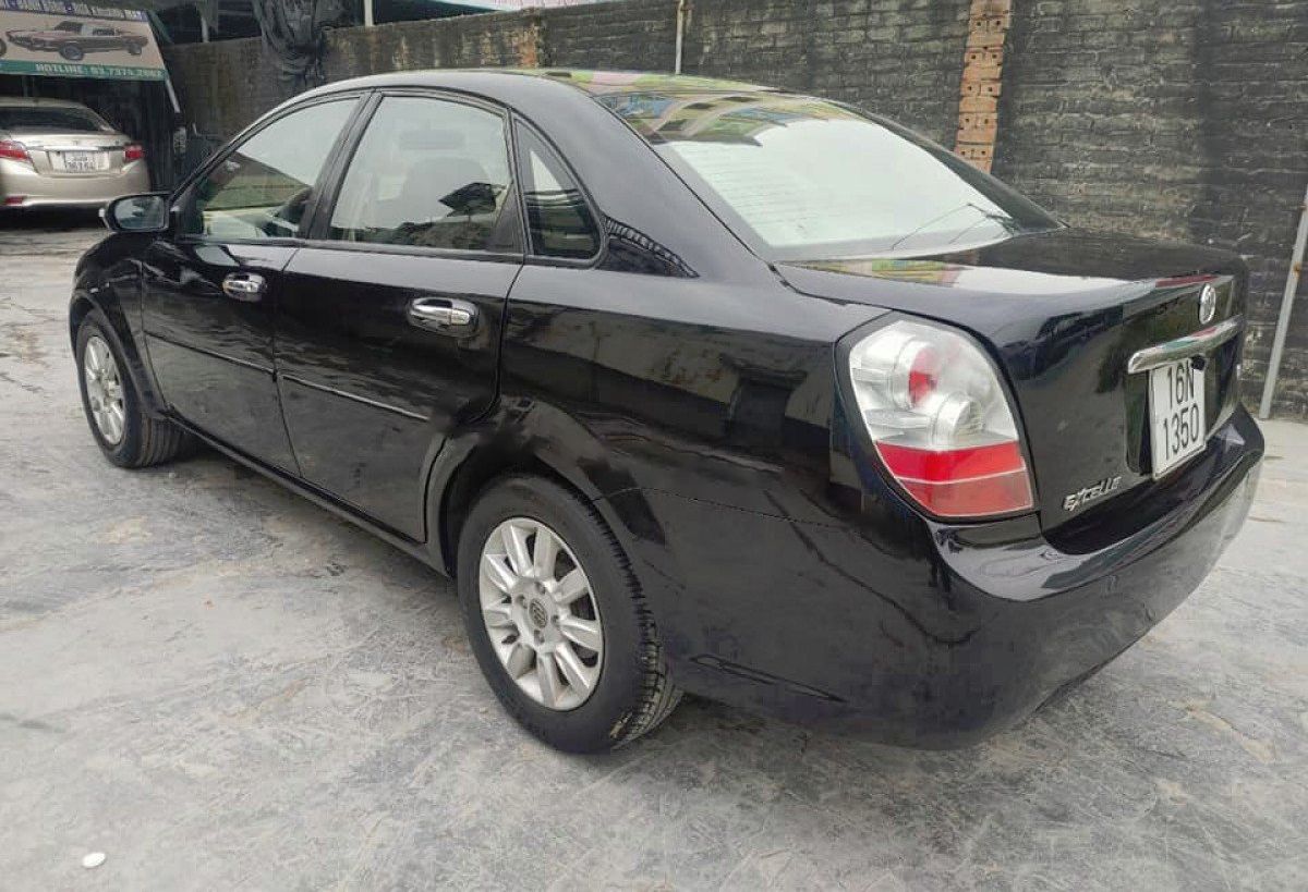 Buick   1.8 AT 2009 - Bán xe Buick Excelle 1.8 AT đời 2009, màu đen, nhập khẩu 