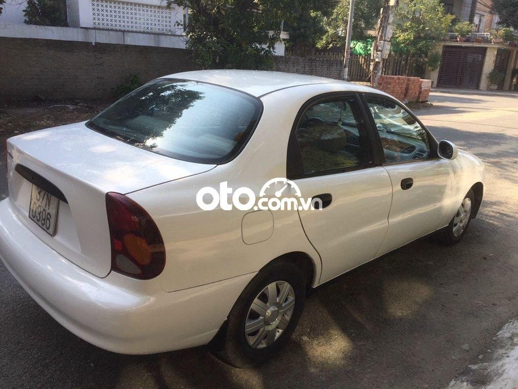 Daewoo Lanos 2004 - Cần bán xe Daewoo Lanos đời 2004, màu trắng