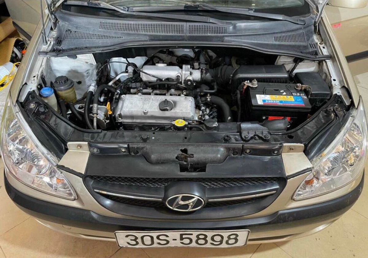 Hyundai Getz   1.1 MT  2009 - Cần bán gấp Hyundai Getz 1.1 MT sản xuất năm 2009, màu vàng, nhập khẩu