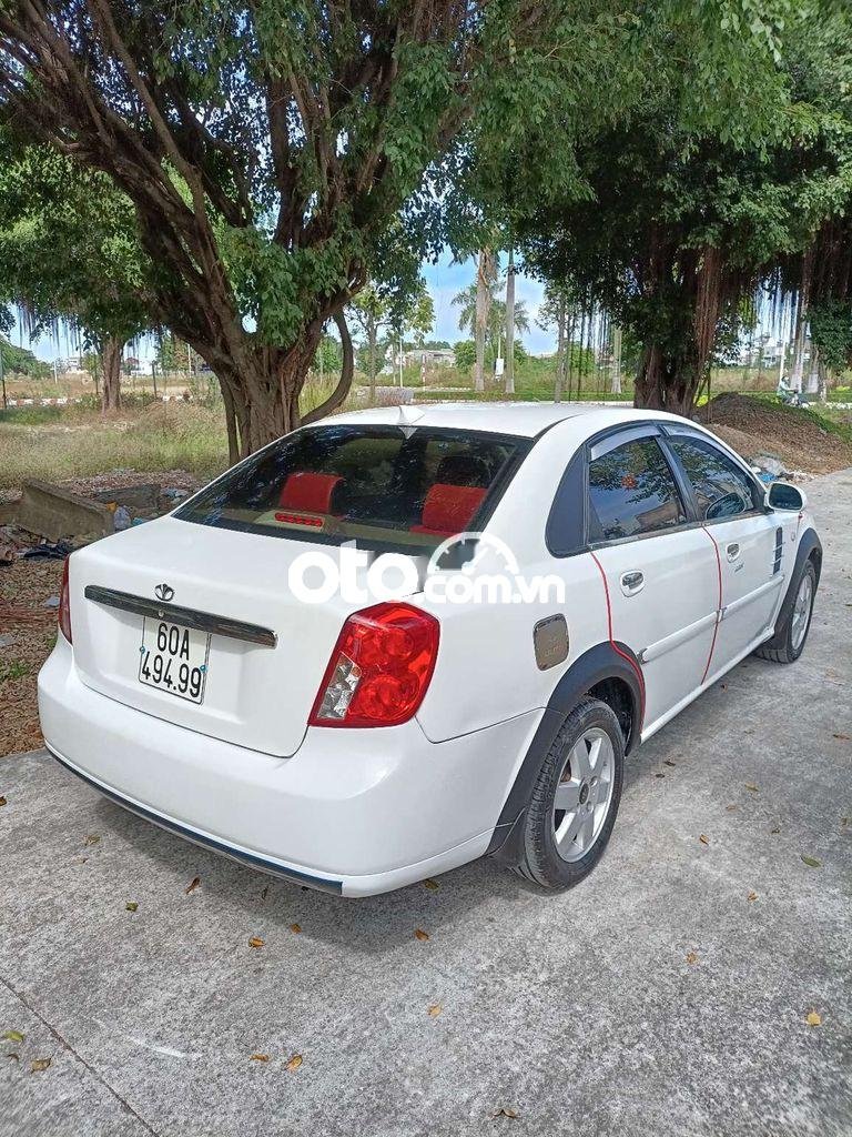 Daewoo Lacetti MT 2004 - Bán Daewoo Lacetti MT 2004, màu trắng, xe nhập