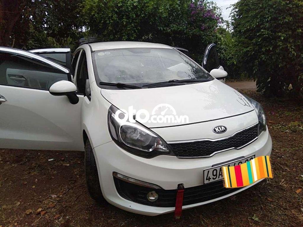 Kia Rio  1.4L MT 2015 - Bán xe Kia Rio 1.4L MT sản xuất 2015, màu trắng