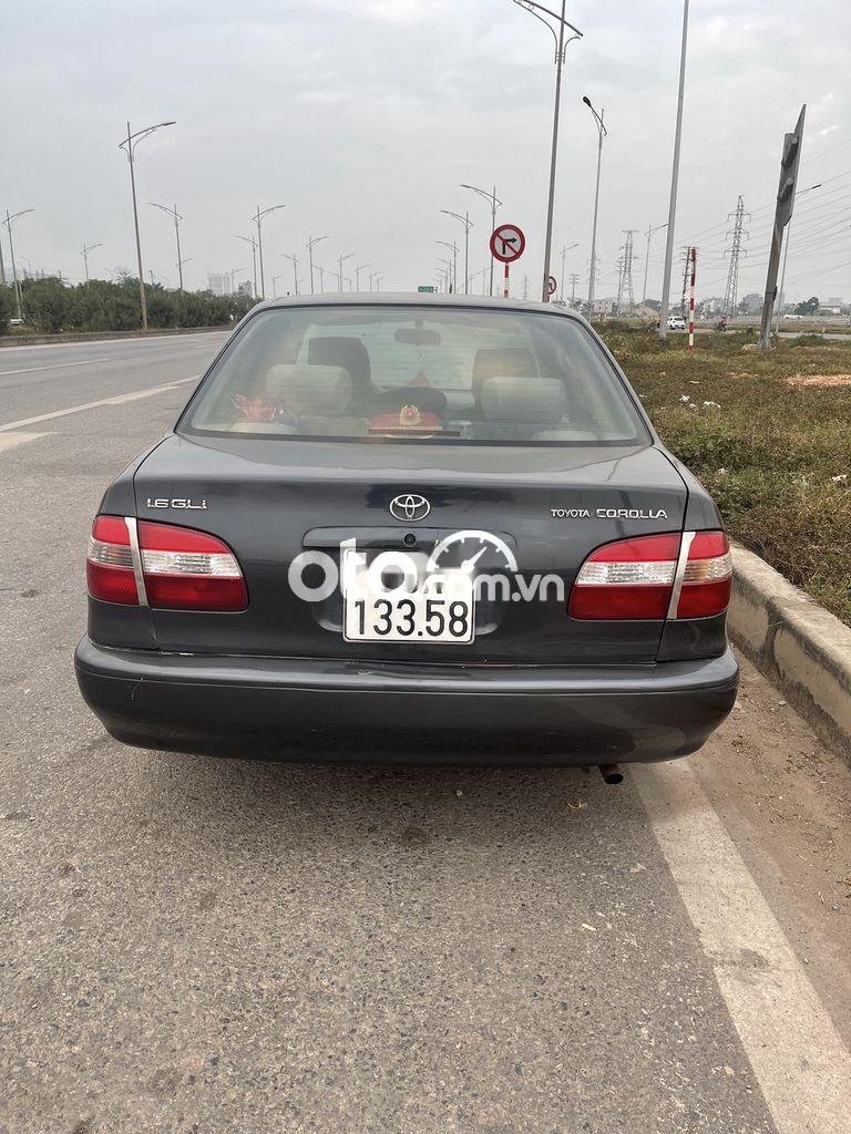 Toyota Corolla LE GLi 1997 - Bán Toyota Corolla LE GLI sản xuất năm 1997, màu đen, nhập khẩu Nhật Bản