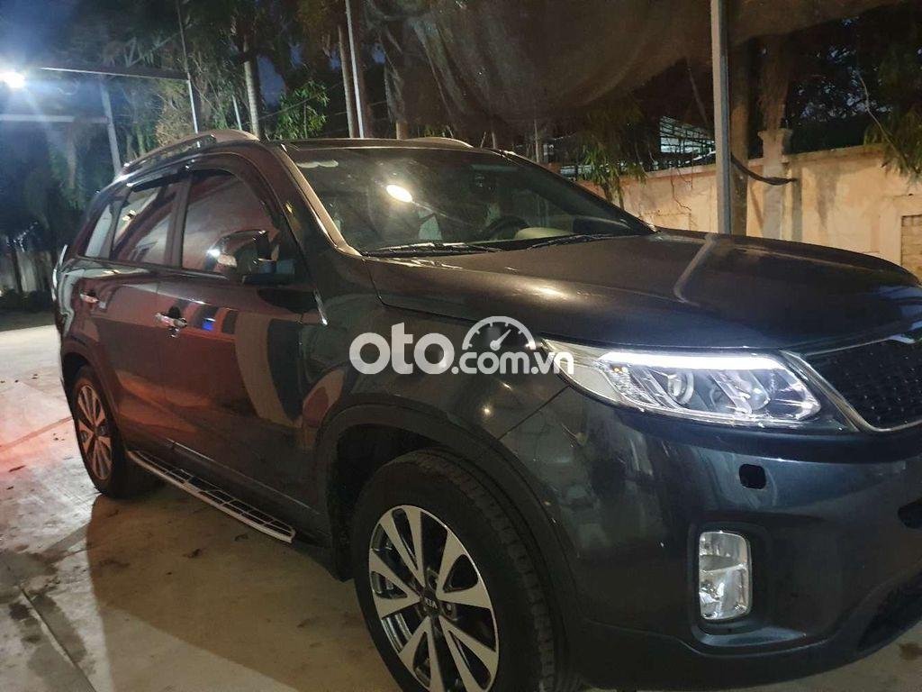 Kia Sorento  AT 2014 - Bán Kia Sorento AT sản xuất 2014, màu đen xe gia đình