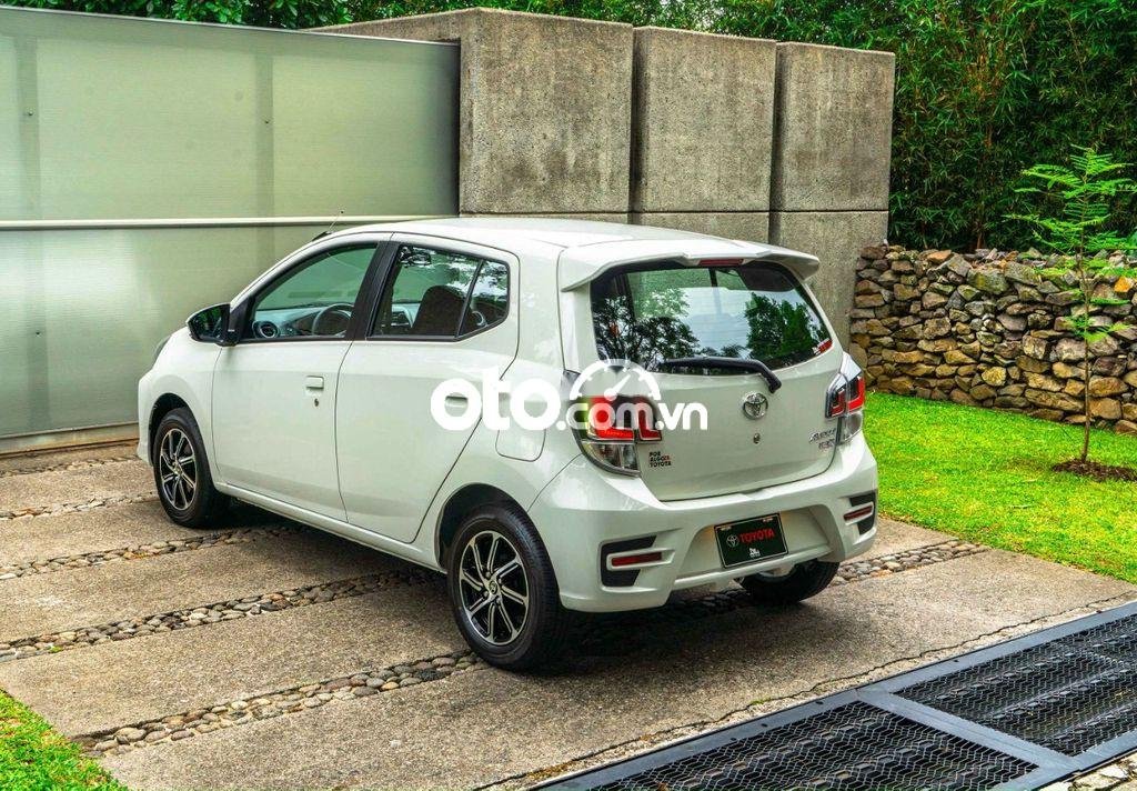 Toyota 1.2 AT 2021 - Cần bán xe Toyota Wigo 1.2 AT 2021, màu trắng, xe nhập, giá 385tr