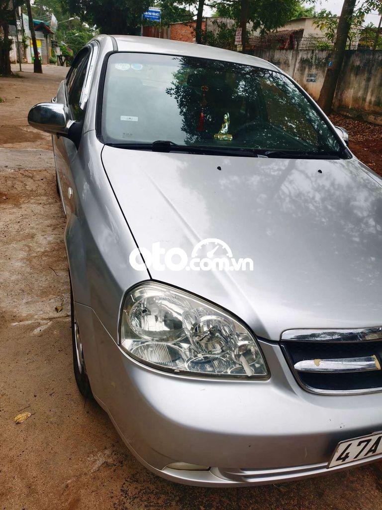 Daewoo Lacetti  MT 2010 - Bán ô tô Daewoo Lacetti MT năm 2010, màu bạc 