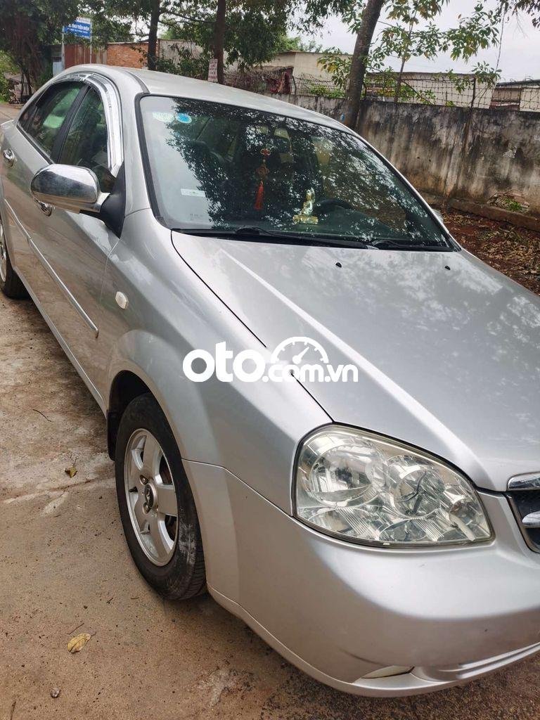 Daewoo Lacetti  MT 2010 - Bán ô tô Daewoo Lacetti MT năm 2010, màu bạc 