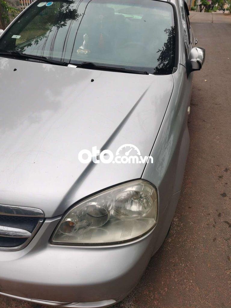 Daewoo Lacetti  MT 2010 - Bán ô tô Daewoo Lacetti MT năm 2010, màu bạc 