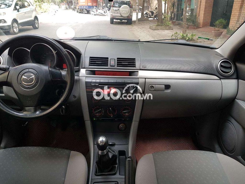 Mazda 3   1.6 MT  2007 - Cần bán gấp Mazda 3 1.6 MT đời 2007, màu đen