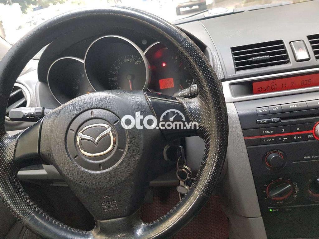 Mazda 3   1.6 MT  2007 - Cần bán gấp Mazda 3 1.6 MT đời 2007, màu đen