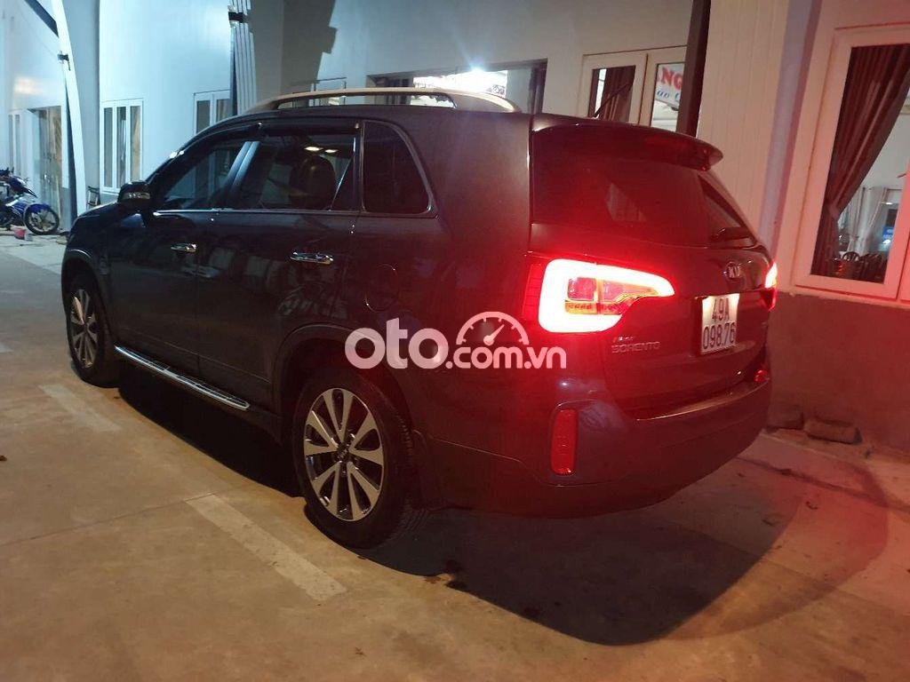 Kia Sorento  AT 2014 - Bán Kia Sorento AT sản xuất 2014, màu đen xe gia đình