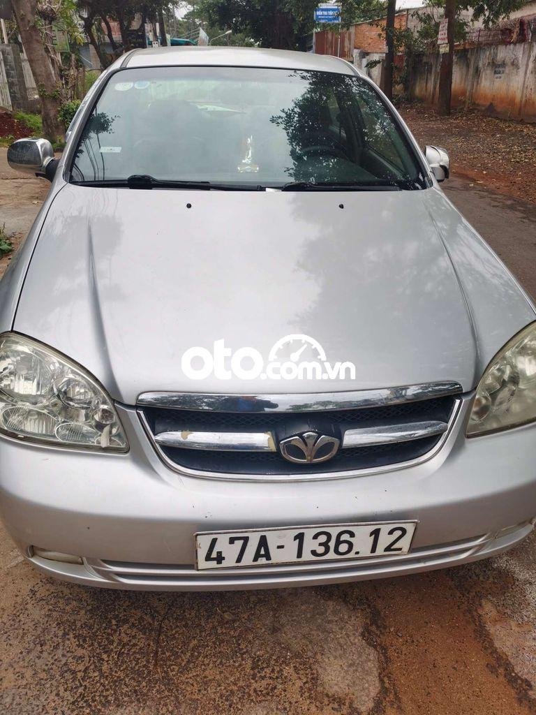 Daewoo Lacetti  MT 2010 - Bán ô tô Daewoo Lacetti MT năm 2010, màu bạc 