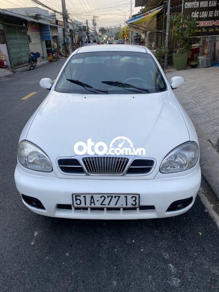 Daewoo Lanos MT 2003 - Cần bán Daewoo Lanos MT đời 2003, màu trắng, nhập khẩu nguyên chiếc chính chủ