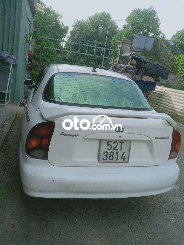 Daewoo Lanos MT 2001 - Cần bán xe Daewoo Lanos MT năm 2001, màu trắng, xe nhập 