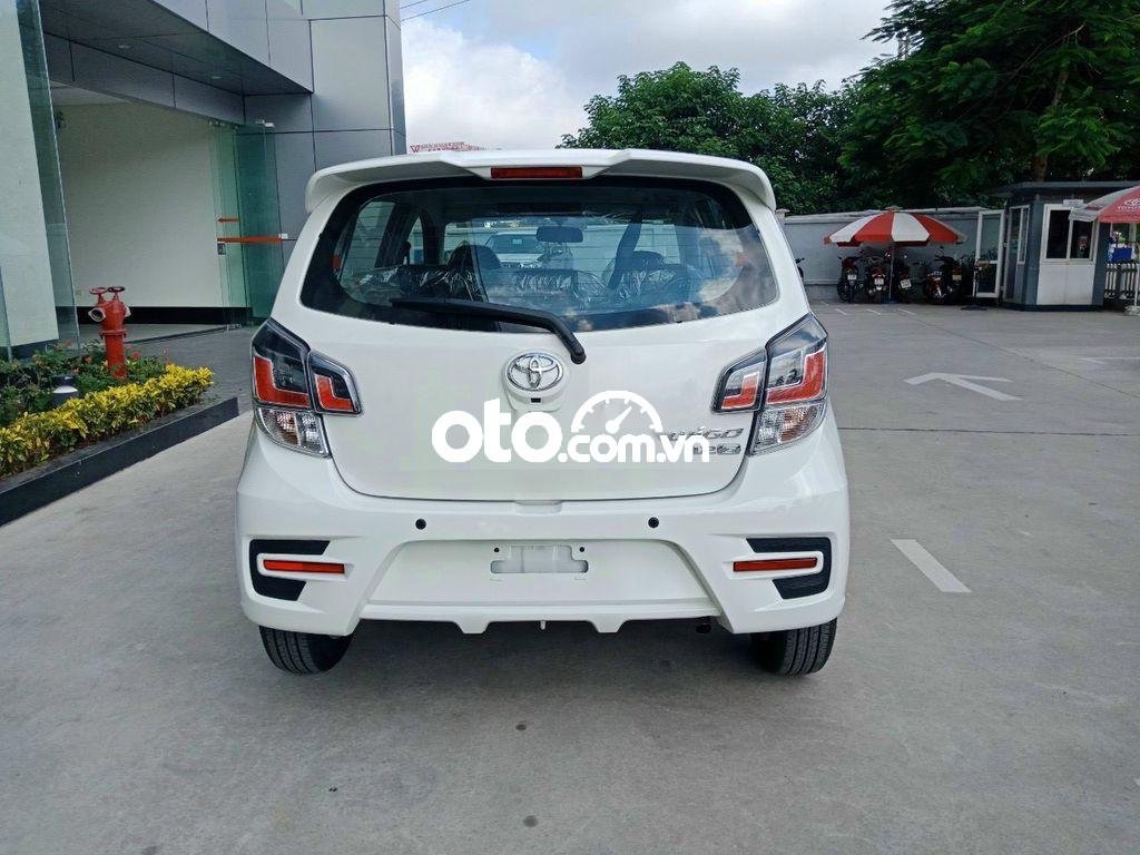 Toyota 1.2 AT 2021 - Cần bán xe Toyota Wigo 1.2 AT 2021, màu trắng, xe nhập, giá 385tr