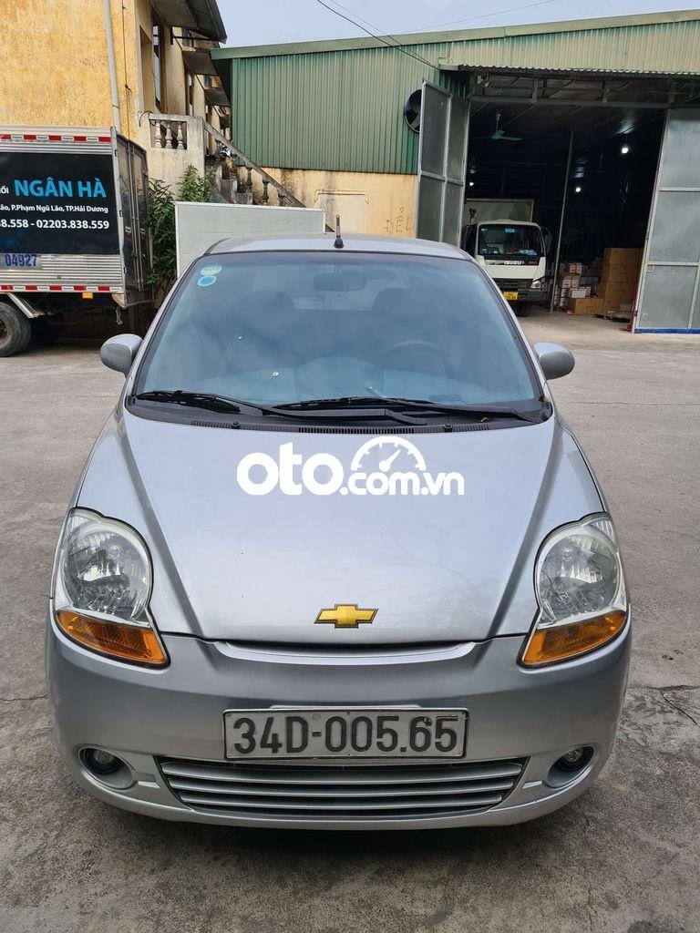 Chevrolet Spark MT 2012 - Cần bán lại xe Chevrolet Spark MT sản xuất 2012, màu bạc, giá tốt