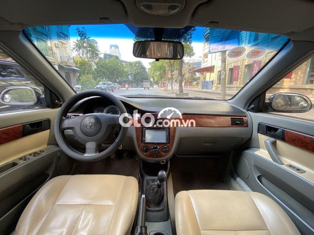 Daewoo Lacetti   EX 2010 - Cần bán Daewoo Lacetti EX sản xuất năm 2010, màu đen số sàn, giá 150tr