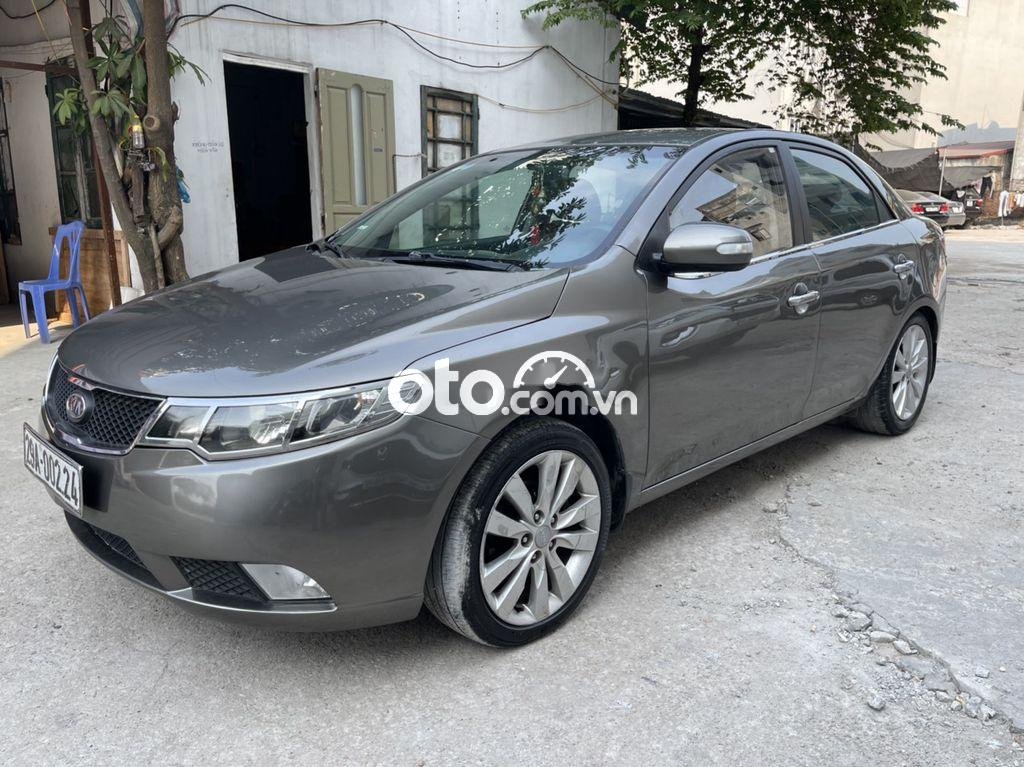 Kia Forte  MT 2010 - Cần bán gấp Kia Forte MT đời 2010, màu xám, nhập khẩu nguyên chiếc chính chủ