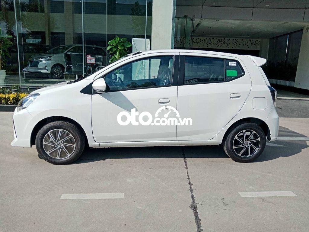 Toyota 1.2 AT 2021 - Cần bán xe Toyota Wigo 1.2 AT 2021, màu trắng, xe nhập, giá 385tr