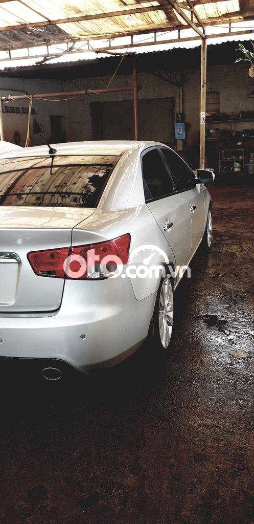 Kia Cerato   AT   2009 - Cần bán gấp Kia Cerato AT năm 2009, màu bạc, xe nhập xe gia đình