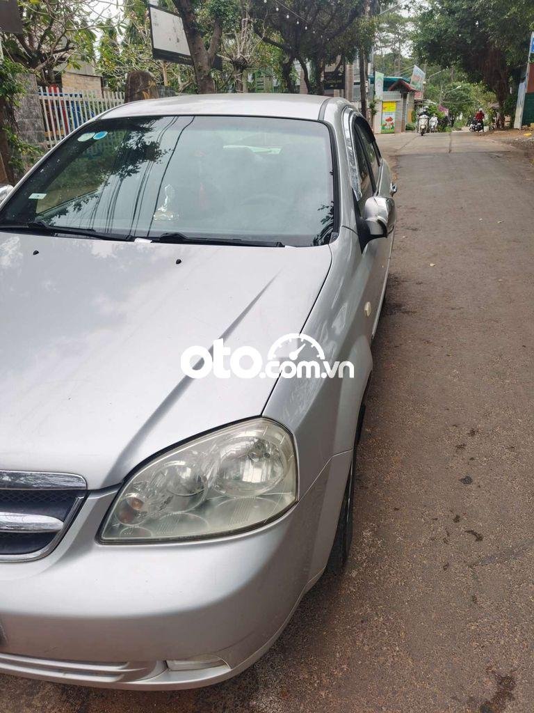 Daewoo Lacetti  MT 2010 - Bán ô tô Daewoo Lacetti MT năm 2010, màu bạc 