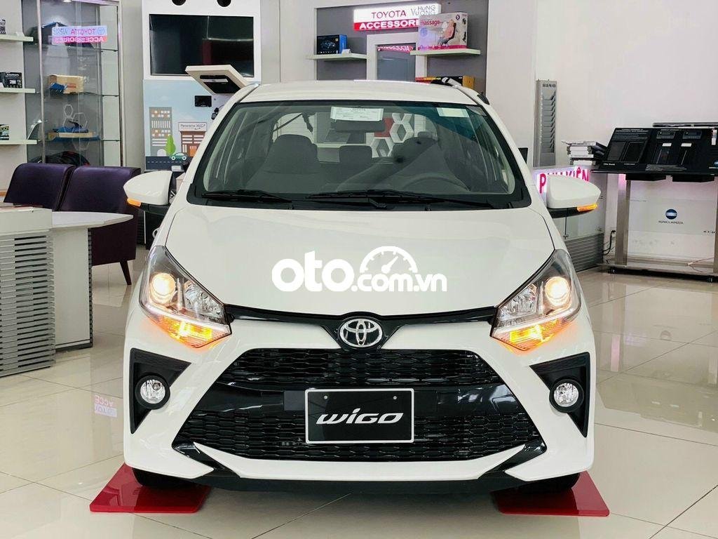 Toyota 1.2 AT 2021 - Cần bán xe Toyota Wigo 1.2 AT 2021, màu trắng, xe nhập, giá 385tr