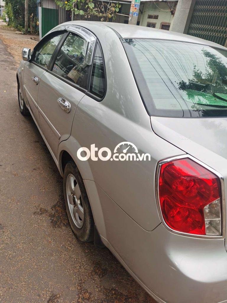 Daewoo Lacetti  MT 2010 - Bán ô tô Daewoo Lacetti MT năm 2010, màu bạc 