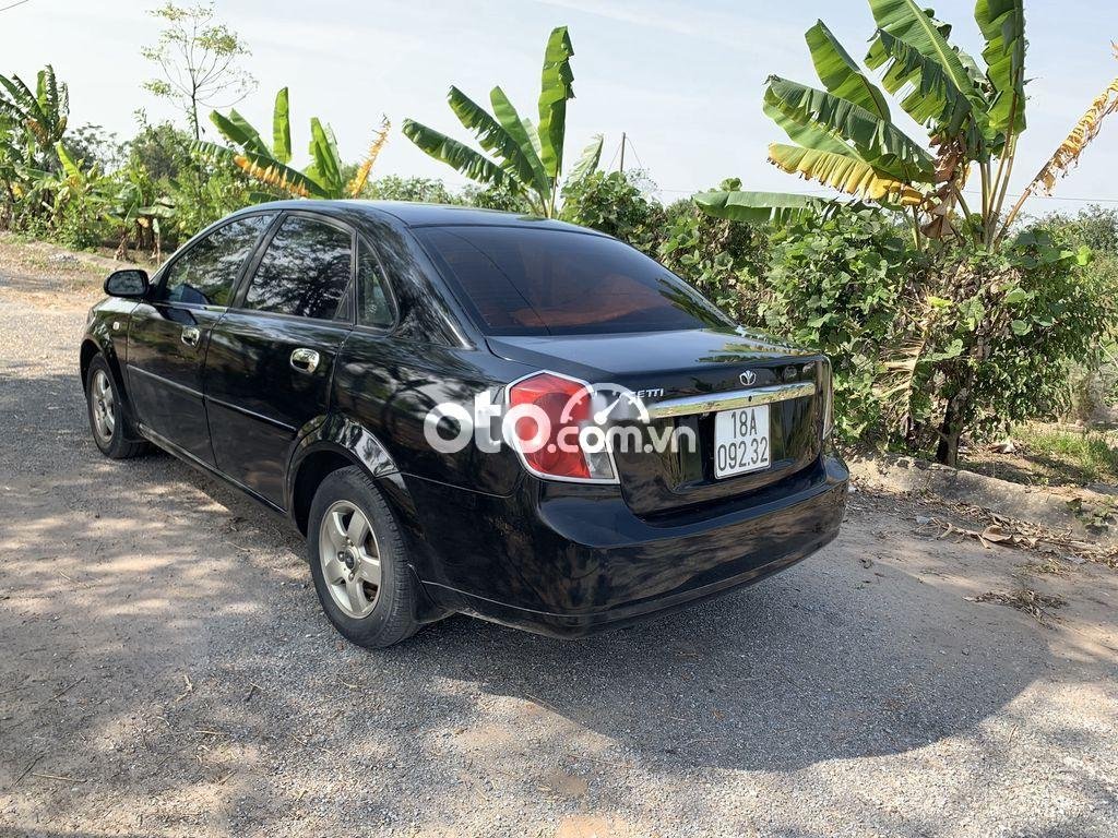 Daewoo Lacetti MT 2005 - Cần bán Daewoo Lacetti MT 2005, màu đen, nhập khẩu  