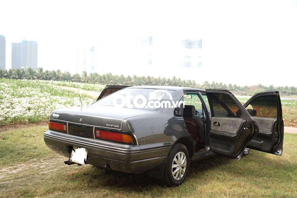 Nissan Cefiro 1992 - Cần bán gấp Nissan Cefiro MT sản xuất 1992, màu xám, xe nhập