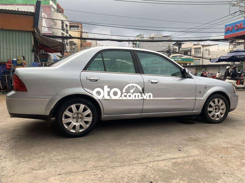 Ford Laser   1.8AT 2004 - Cần bán Ford Laser 1.8AT sản xuất 2004, màu bạc, xe nhập  