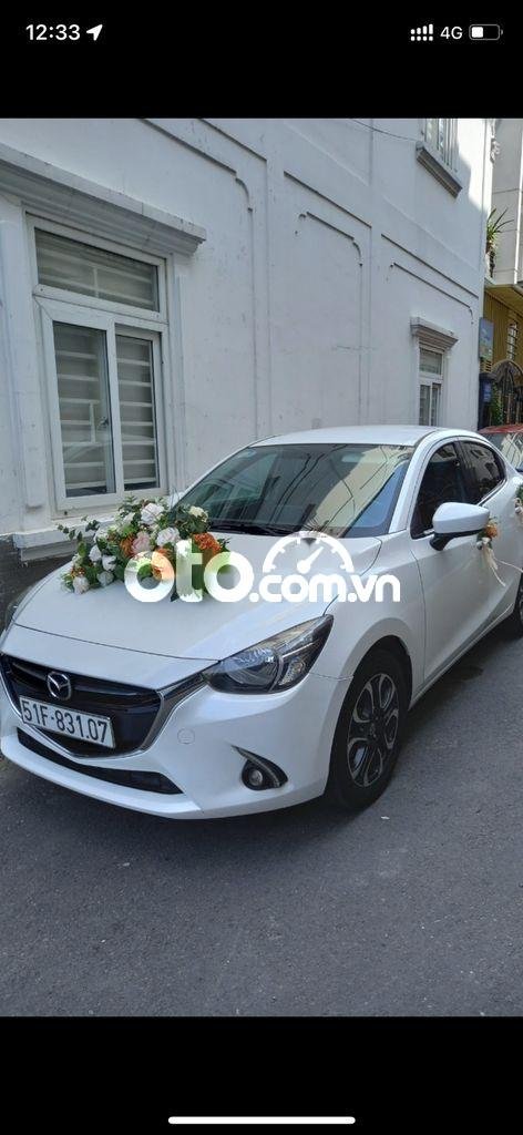 Mazda 2 2016 - Bán xe Mazda 2 AT năm 2016, màu trắng, giá tốt