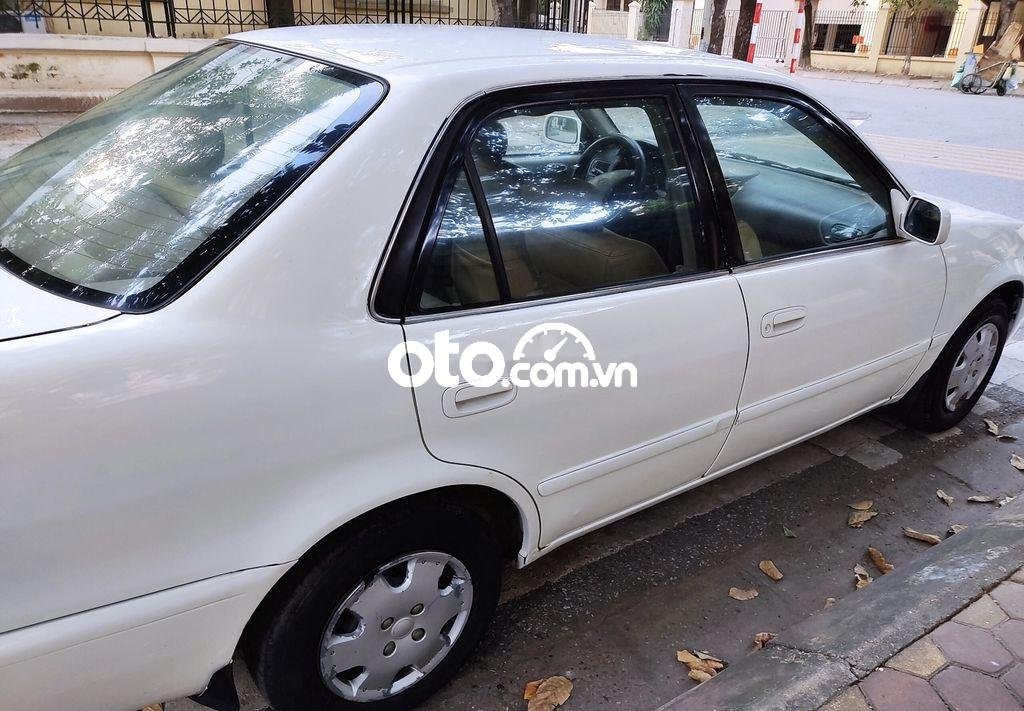 Toyota Corolla MT 1997 - Cần bán xe Toyota Corolla MT năm sản xuất 1997, màu trắng, nhập khẩu nguyên chiếc chính chủ