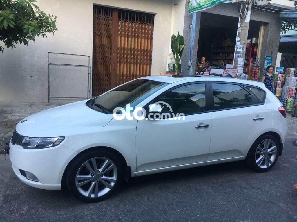 Kia Cerato     1.6AT 2011 - Bán Kia Cerato 1.6AT sản xuất 2011, màu trắng, nhập khẩu nguyên chiếc, 365tr