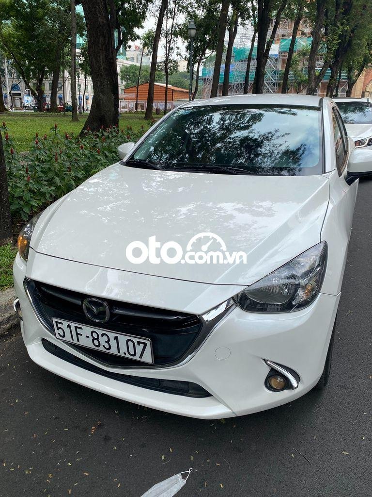 Mazda 2 2016 - Bán xe Mazda 2 AT năm 2016, màu trắng, giá tốt