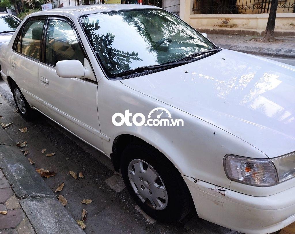 Toyota Corolla MT 1997 - Cần bán xe Toyota Corolla MT năm sản xuất 1997, màu trắng, nhập khẩu nguyên chiếc chính chủ