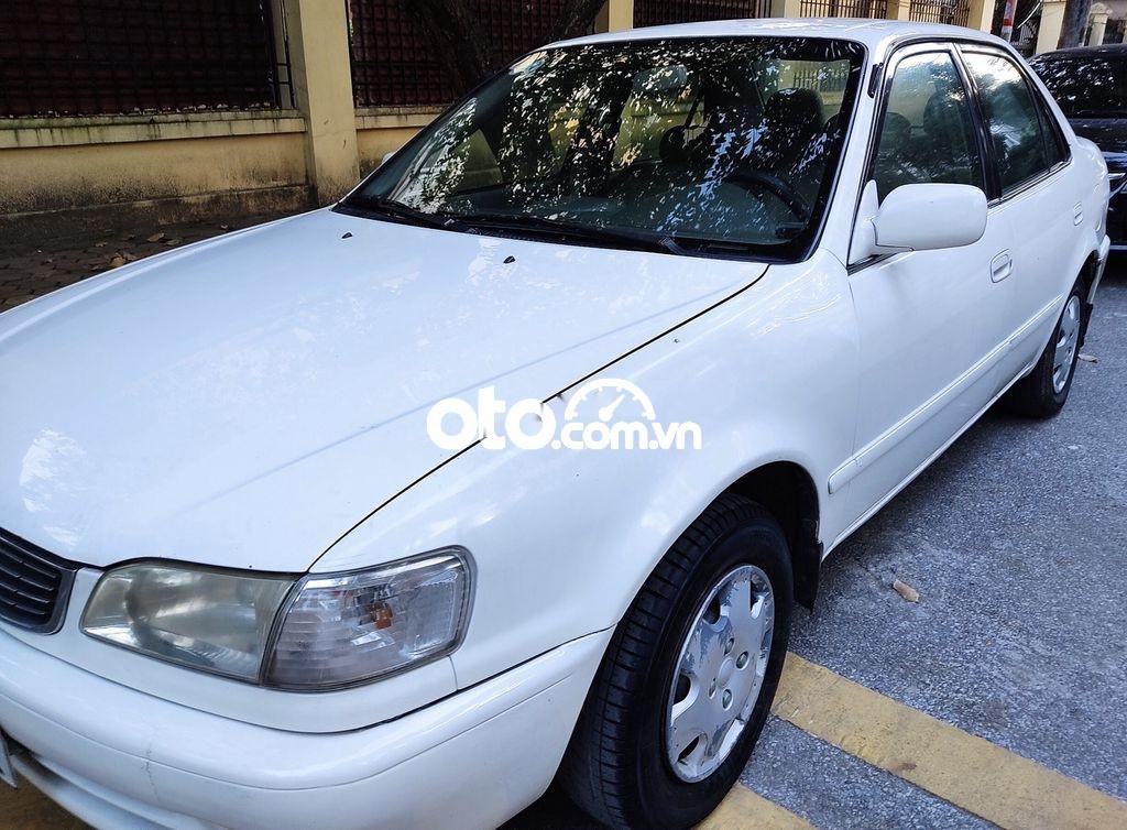 Toyota Corolla MT 1997 - Cần bán xe Toyota Corolla MT năm sản xuất 1997, màu trắng, nhập khẩu nguyên chiếc chính chủ