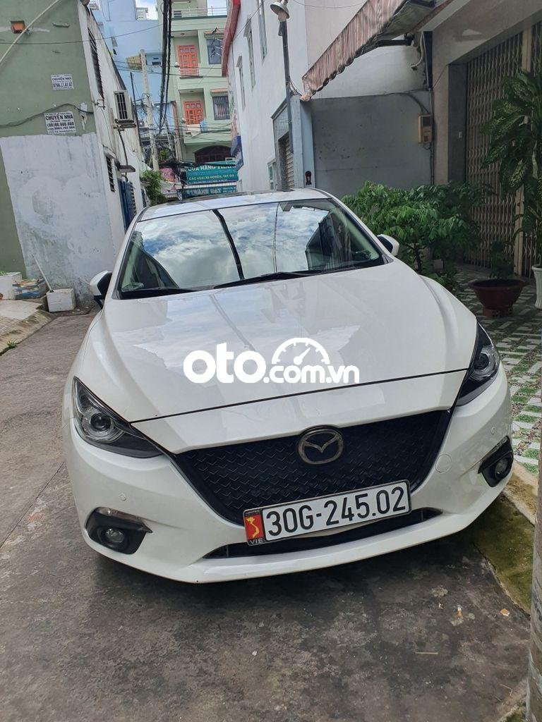 Mazda 3  1.5AT  2016 - Cần bán lại xe Mazda 3 1.5AT năm sản xuất 2016, màu trắng