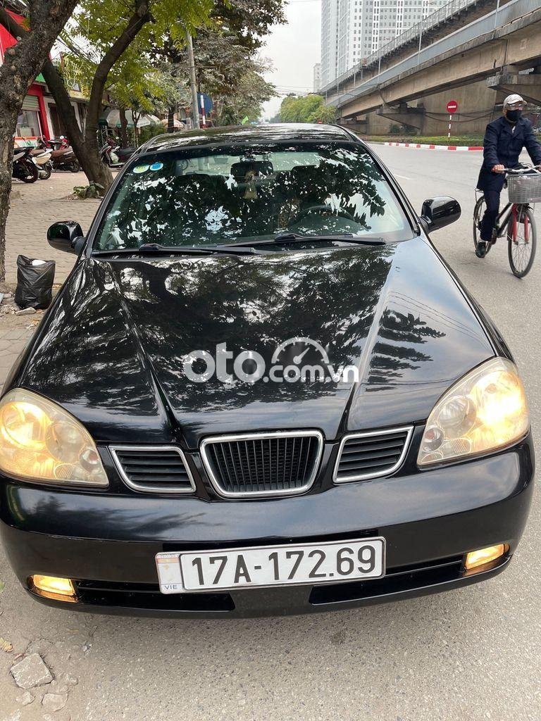 Daewoo Lacetti 2004 - Bán Daewoo Lacetti sản xuất năm 2004, màu đen giá cạnh tranh