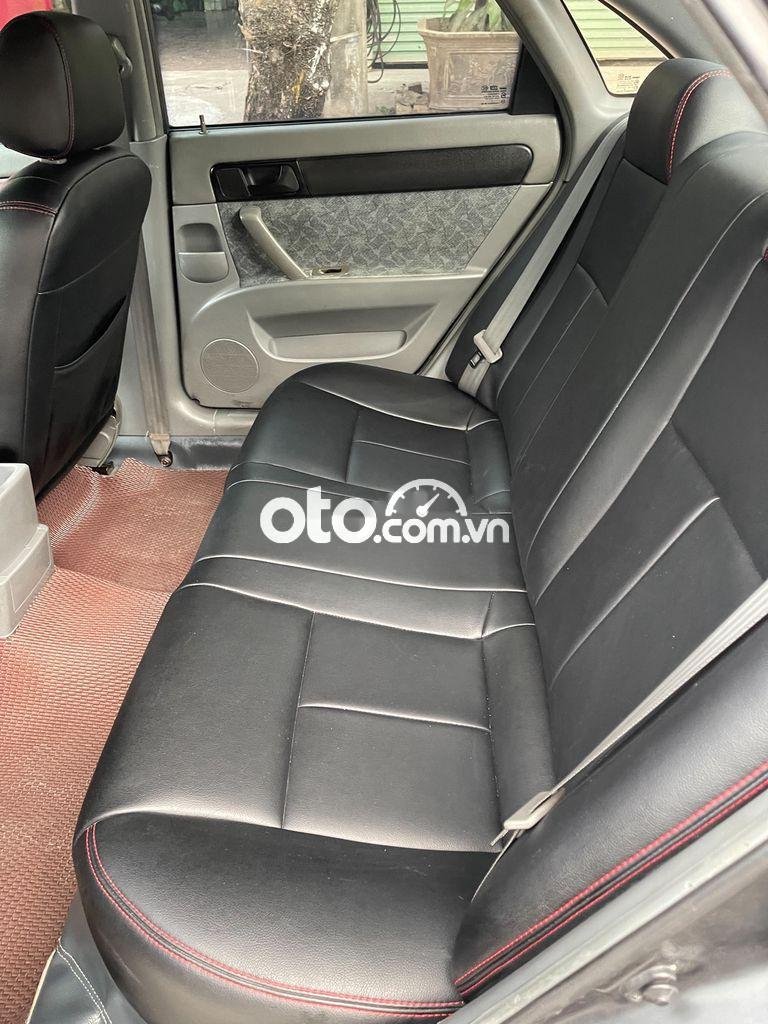 Daewoo Lacetti 2004 - Bán Daewoo Lacetti sản xuất năm 2004, màu đen giá cạnh tranh