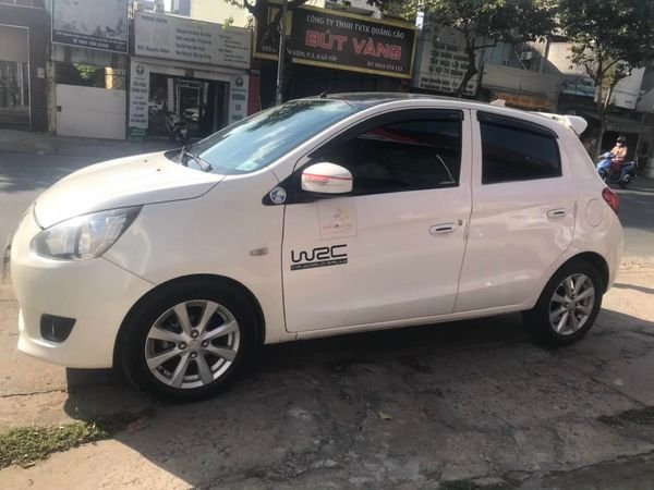 Mitsubishi Mirage 2014 - Cần bán Mitsubishi Mirage sản xuất năm 2014, màu trắng số sàn