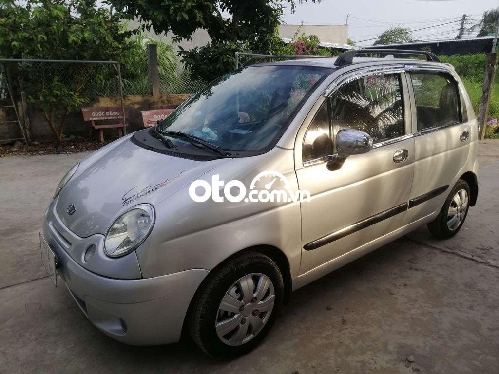 Daewoo Matiz MT 2004 - Bán Daewoo Matiz MT năm 2004, màu bạc, xe nhập xe gia đình